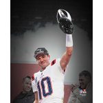 Drake Maye New England Patriots Unsigned Holding 2025 AFC Championship Trophy Spotlight Photograph